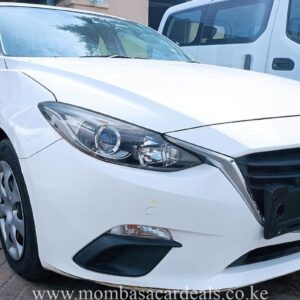 White Mazda Axela for sale in Mombasa.