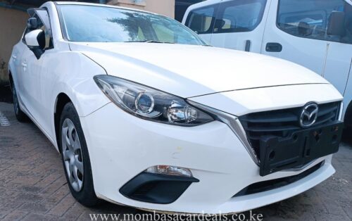 White Mazda Axela for sale in Mombasa.
